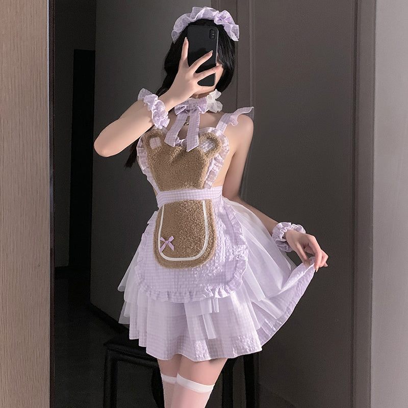 Cute bear cosplaying a maid uniform
