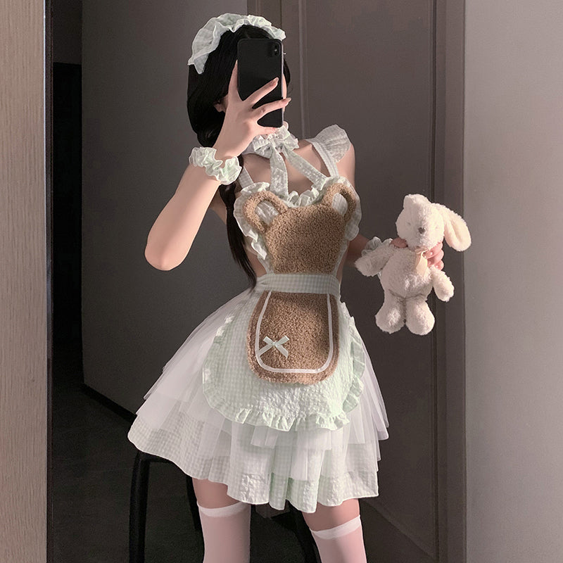 Cute bear cosplaying a maid uniform